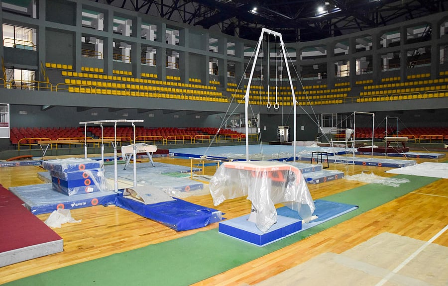 Sports equipment covered with plastic sheets to avoid damage due to seeping rainwater at the Chamundi Vihar Multi-Purpose Indoor Stadium in Mysuru.