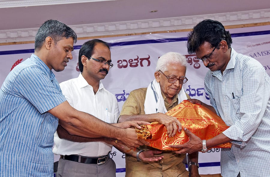 Senior writer S Diwakar releases DVG global literary series first work “Samskriti” in Mangaluru on Sunday.