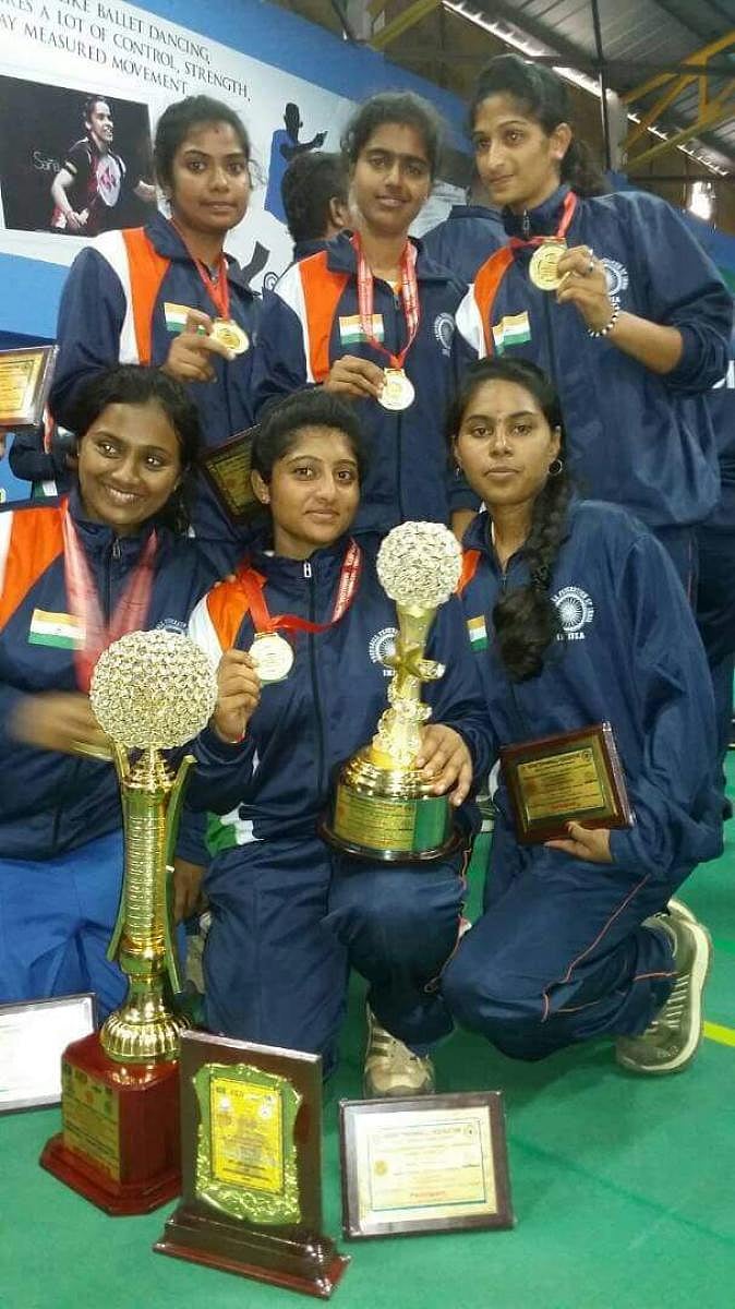 Tashma Muthappa (standing left)