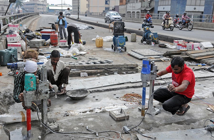 A file photo of repair work at the Sirsi Circle flyover, undertaken a few years ago.