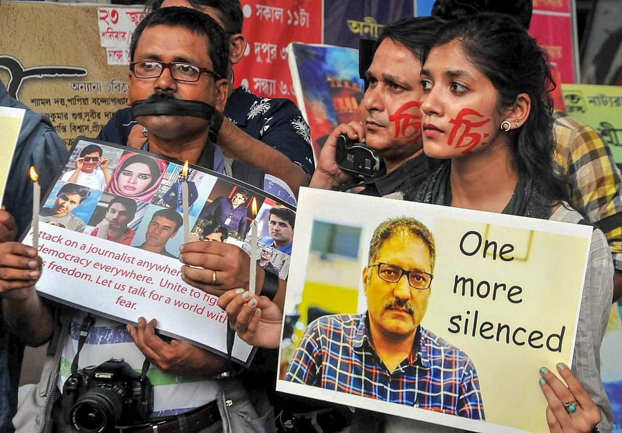 Bukhari, editor of Rising Kashmir was killed along with his two personal security officers (PSOs) on June 14 evening when he was coming out of his office and boarding his car. PTI file photo.