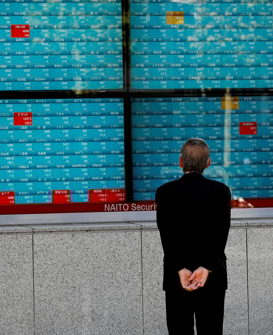 In early trade Hong Kong fell 0.3 percent after fluctuating between gains and losses, while Tokyo ended the morning 0.1 percent off and Shanghai lost more than one percent. (Reuters file photo)