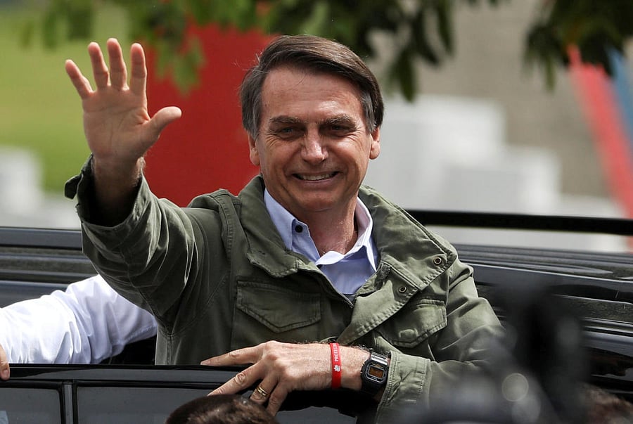 Jair Bolsonaro, far-right lawmaker and presidential candidate of the Social Liberal Party (PSL), gestures at a polling station in Rio de Janeiro, Brazil October 28, 2018. (REUTERS Photo)