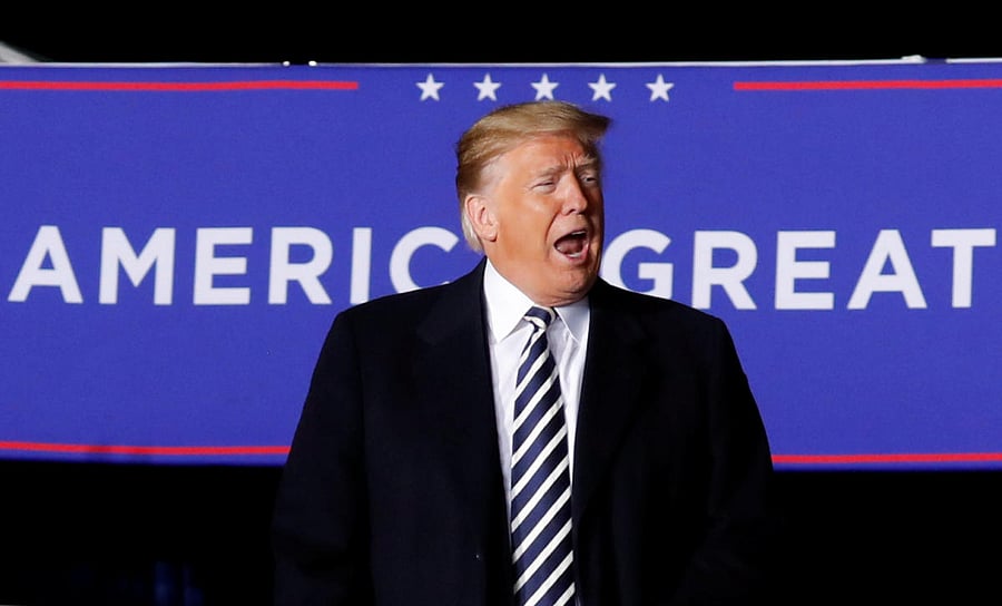 Trump told journalists at the White House that a group of several thousand migrants walking through Mexico towards the US border had thrown rocks "viciously and violently" at Mexican police. (Reuters Photo)