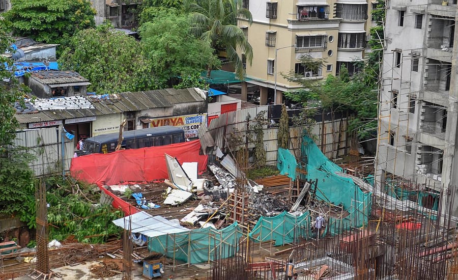 The debris of the chartered plane that crashed in Ghatkopar's Jivdaya Lane, in Mumbai on Friday. PTI