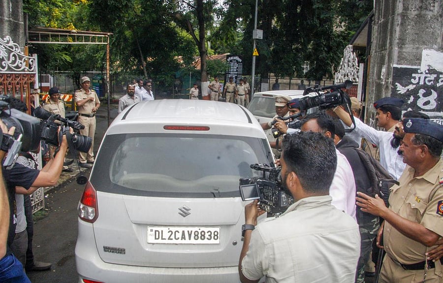 Activist Narendra Dabholkar's alleged shooter Sachin Prakasrao Andure being brought to Pune Sessions Court, in Pune on Sunday. PTI photo