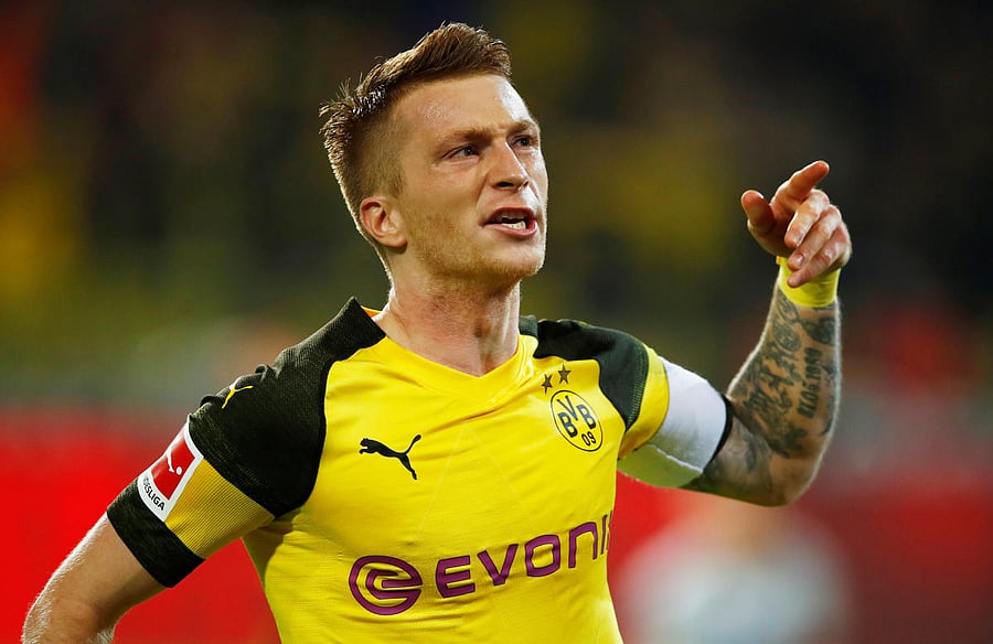 Borussia Dortmund's Marco Reus celebrates after scoring his second goal against Bayern Munich on Saturday. REUTERS
