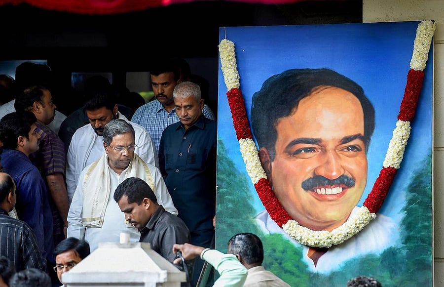Former Chief Minister Siddaramaiah comes out after paying his last respects to Union Parliamentary Affairs Minister Ananth Kumar in Bengaluru on Monday. (PTI)