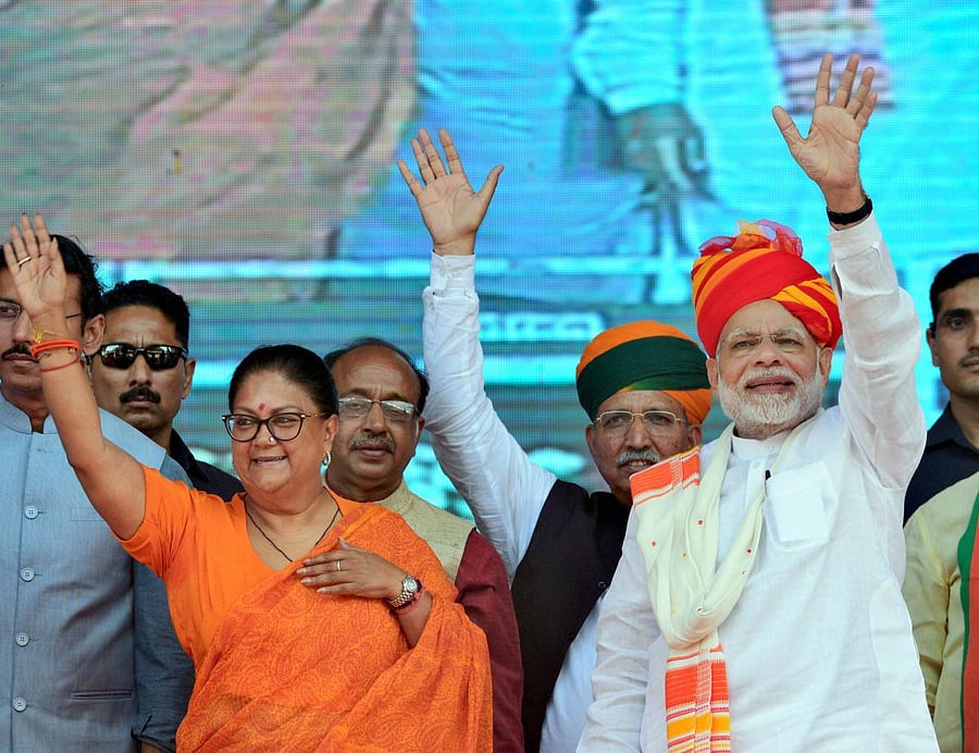 Prime Minister Narendra Modi and Rajasthan Chief Minister Vasundhara Raje. (PTI File Photo)