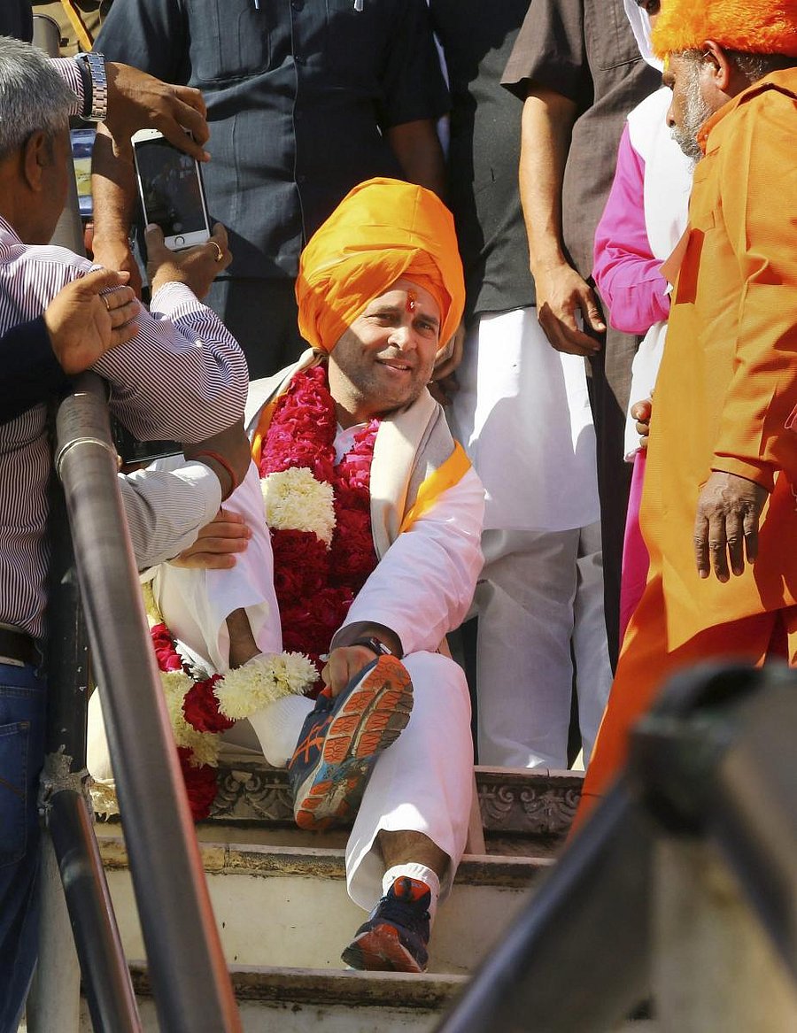 Congress President Rahul Gandhi leaves after offering prayers at Brahma Temple in Pushkar on Monday. PTI