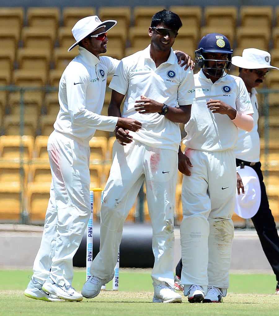 K Gowtham (centre) bagged 6/139 as India 'A' dismissed New Zealand 'A' for 398 in their first innings. DH File Photo