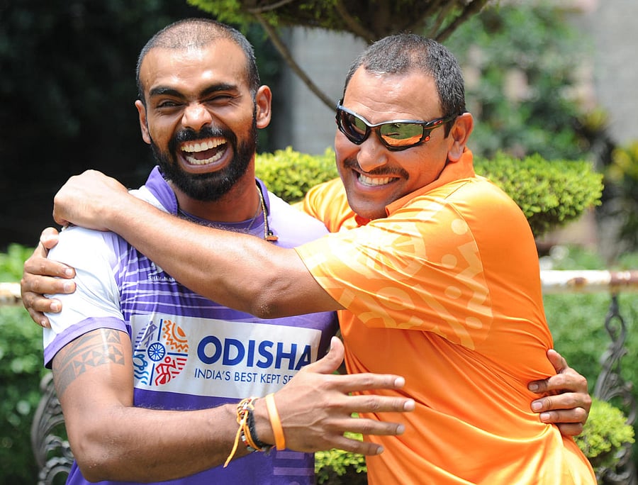 GREAT CAMARADERIE PR Sreejesh (left) hailed the appointment of Harendra Singh as the coach of the men's team. DH PHOTO/ SRIKANTA SHARMA R