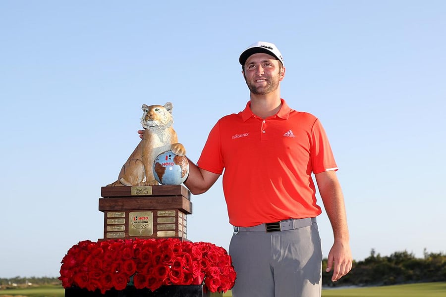 Spain's Jon Rahm poses with the Hero World Challenge trophy at Albany, Bahamas on Sunday. AFP