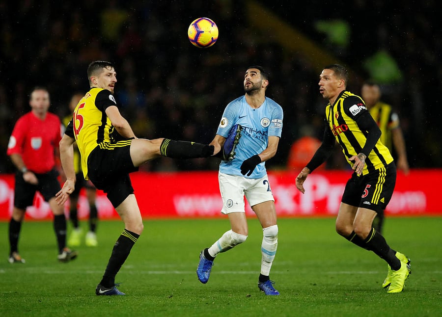 Watford's Craig Cathcart in action with Manchester City's Riyad Mahrez. (Reuters)