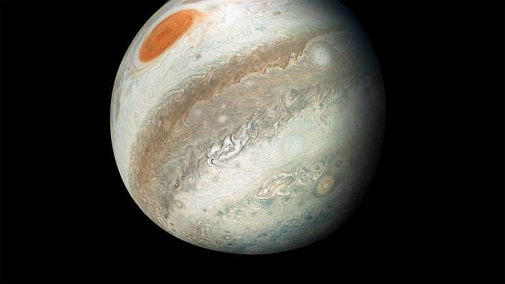 This extraordinary view of Jupiter was captured by NASA’s Juno spacecraft on the outbound leg of its 12th close flyby of the gas giant planet. Scientists have discovered 12 new moons orbiting Jupiter, bringing its total number of natural satellites to 79. NASA/JPL-CALTECH/SWRI/MSSS/GERALD EICHSTÄD/SEÁN DORAN