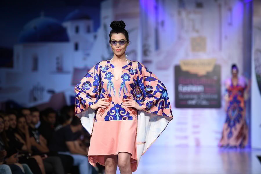 Designer Pria Kartaaria says the colour living coral was popular in the 1960s.