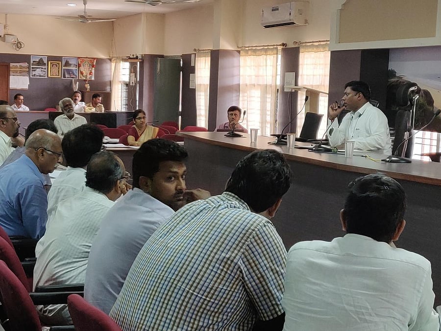 Deputy Commissioner Sasikanth Senthil listens to industrialists during a district-level meeting at his office in Mangaluru on Friday.