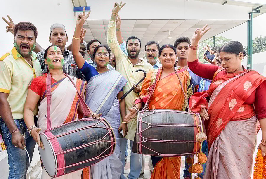 Rashtriya Janata Dal supporters celebrate after their party's victory at Jokihat Assembly by-elections, in Patna on Thursday. PTI