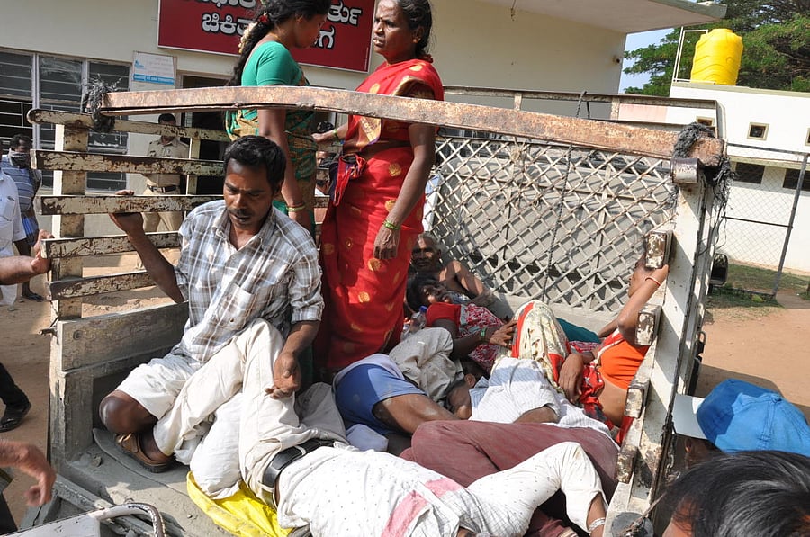 The people, who took ill after eating prasada at a temple at Selavadi in Hanur taluk,are being taken to Kollegala Taluk Hospital in a goods auto