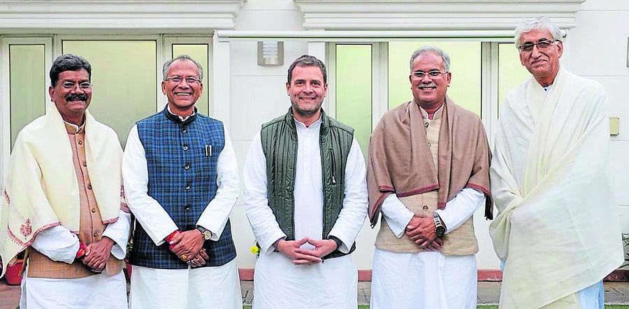 For throne and seats: Congress president Rahul Gandhi (C) with contenders for the post of chief minister of Chhattisgarh (From Left) Charandas Mahant, Tamradhwaj Sahu, Bhupesh Baghel and T S Singhdeo. Twitter/ @RahulGandhi