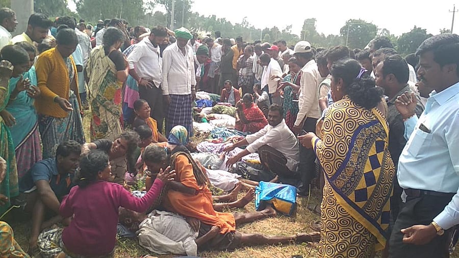 Highly inconsolable relatives and family members weep after the bodies were retrieved near the accident spot. DH Photo