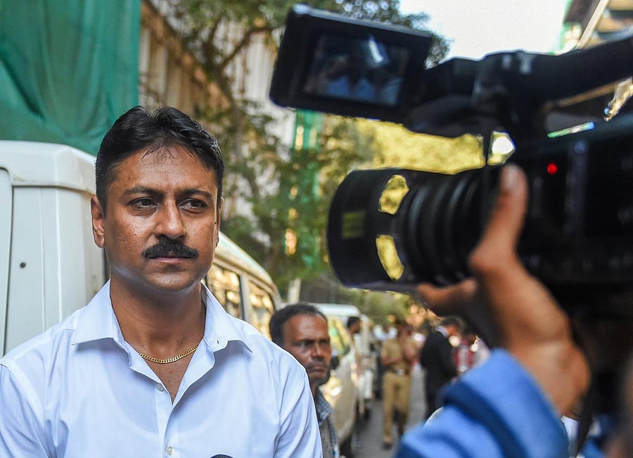 Ashish Pandya, then sub-inspector with the Gujarat Police accused of shooting Tulsiram Prajapati, leaves the special CBI court after being acquitted, in Mumbai on Friday. PTI