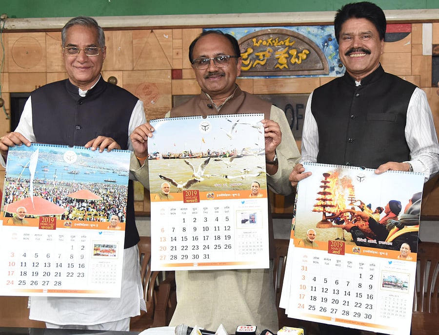 Uttar Pradesh, Medical and Health Minister Siddharth Nath Singh launch Kumbh 2019 calendar at a press conference at Press Club in Bengaluru on Wednesday 26th December 2018. MLC Lehar Singh and FICCI member Jacob Crasta are also seen. DH Photo/Janardhan B