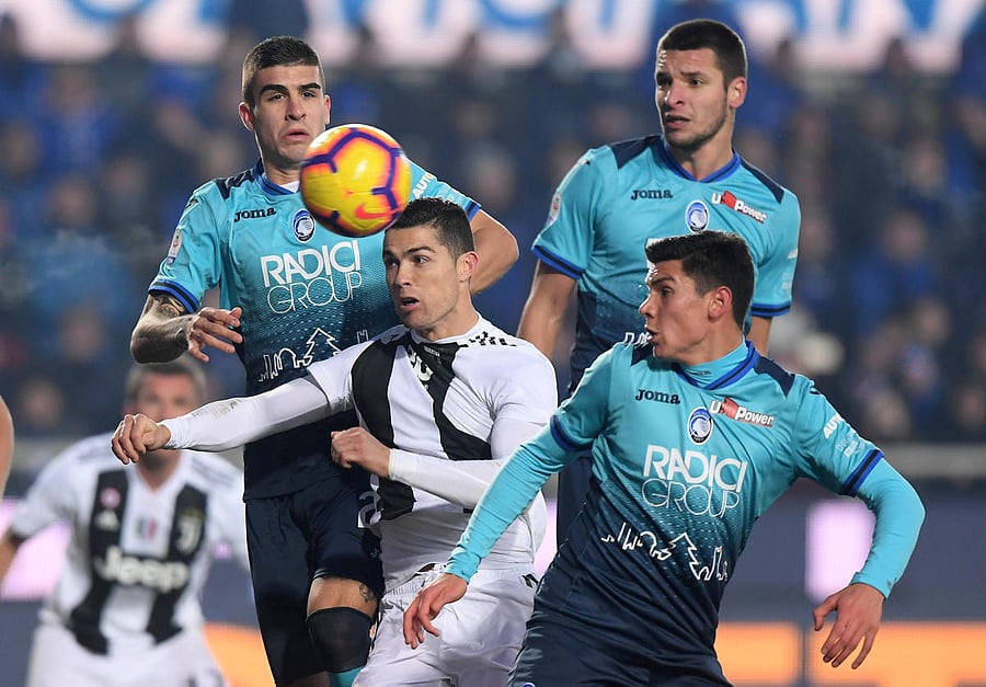 Juventus' Cristiano Ronaldo heads at goal (REUTERS)