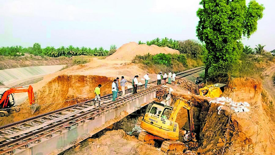 Earthmovers were pressed into service to clear landslideon the rail track near Tarikere in Chikkamagaluru district onFriday.