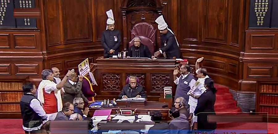 Members protest in the well of the Rajya Sabha in New Delhi, Monday, Dec 31, 2018. (RSTV grab via PTI)