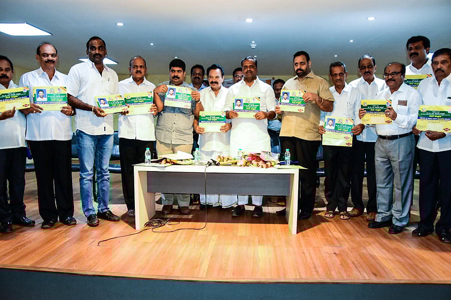 District In-charge Minister U T Khader releases the invitation of ‘Rajatha Sambhrama’ at SCDCC Bank in Mangaluru on Tuesday.