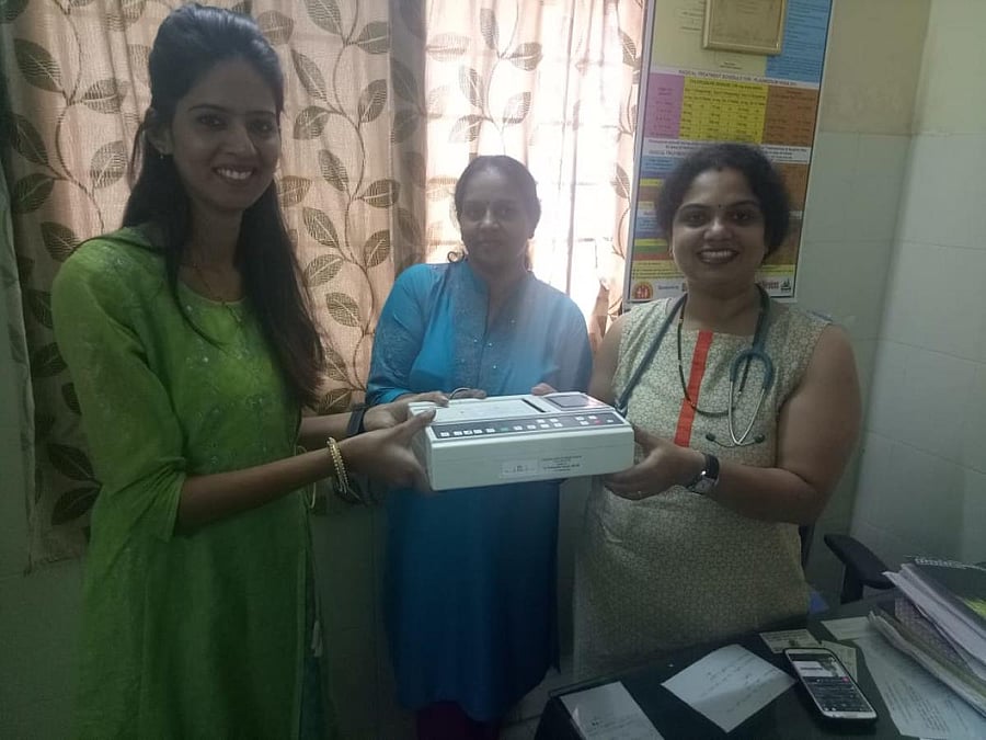 An ECG machine being handed over to a remote Primary Health Centre in Kodagu district.