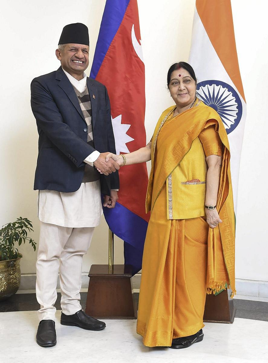 External Affairs Minister Sushma Swaraj greets her Nepali counterpart Pradeep Kumar Gyawali, in New Delhi on Thursday. PTI
