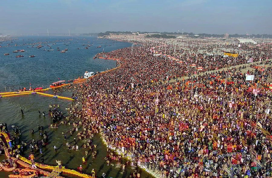 Devotees gather to take bath at Sangam on the occasion of Makar Sankranti, the first Shahi Snan, during Kumbh Mela 2019. (PTI Photo)