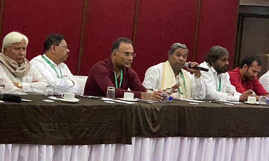 CLP leader Siddaramaiah having a meeting with KPCC party president Dinesh Gundurao, minister Dr. G Parameswara, MLA H K patil and KPCC working president Eswar khandre at a resort in Bengaluru on Saturday.
