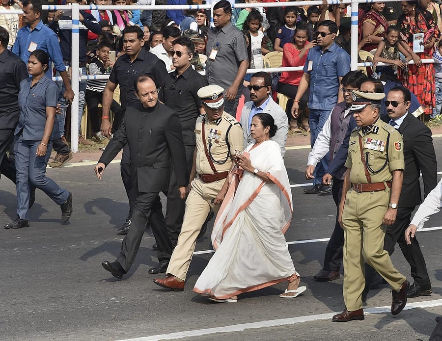 West Bengal Chief Minister Mamata Banerjee arrives to attend the 70th Republic Day celebrations at Red Road, in Kolkata, Saturday. PTI photo