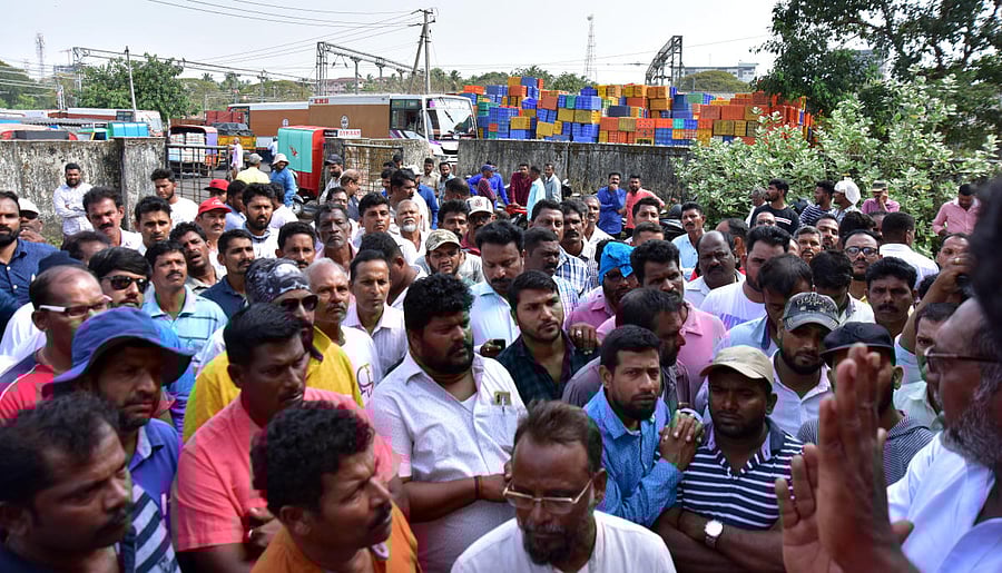 Fishermen stage a protest against the use of lights while fishing in front of the Fisheries Department deputy director’s office at Bunder in Mangaluru. 