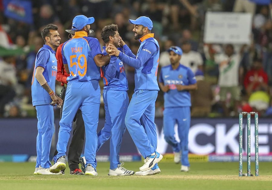 Kuldeep Yadav (centre) of India celebrates during the second one day international between India and New Zealand at Blake Park in Tauranga in New Zealand on Saturday. AP/PTI Photo