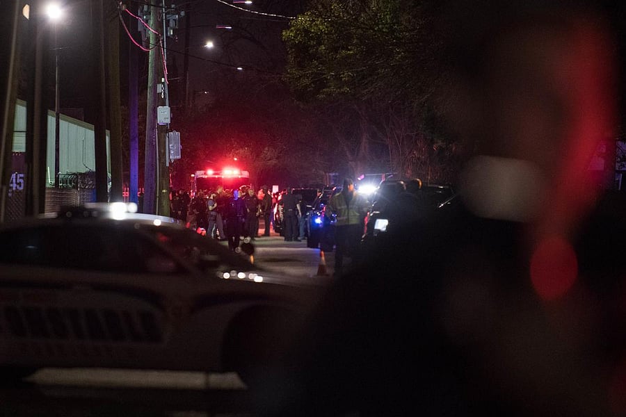 Law enforcement personnel work at the scene of a shooting where five Houston police officers were reported shot in Houston, Texas. AFP