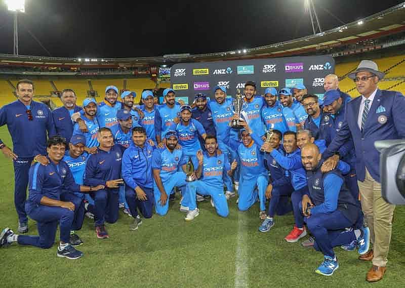 India's players celebrate with the series trophy after beating New Zealand in the fifth one day international at Westpac Stadium in Wellington, New Zealand. (AP/PTI Photo)