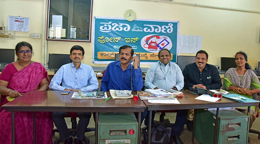 DHO Dr Ramakrishna Rao answers to a call during phone-in programme, organised by Prajavani, at DH-PV Editorial Office at Balmatta in Mangaluru on Monday. Fr Muller Medical College and Hospital Microbiologist Prof Rekha Boloor, Fr Muller Medical College Hospital Associate Professor and Consultant Physician Dr Prashanth, District Vector Borne Disease Control Officer Dr Arun Kumar, Surveillance Officer Dr Praveen, Entomologist of department of Health and Family Welfare Manjula look on.