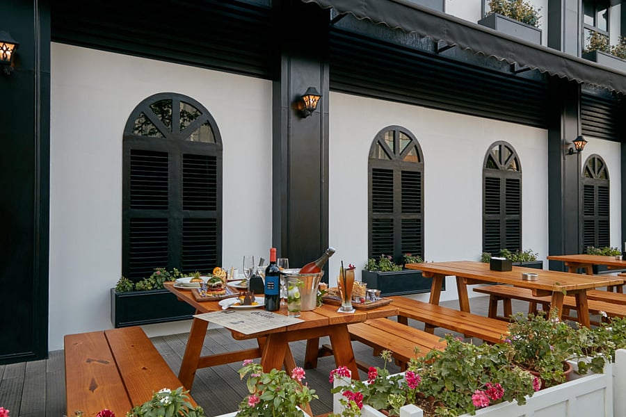 The picnic tables at The Whitefield Arms give the pub a cosy, casual British ambience.