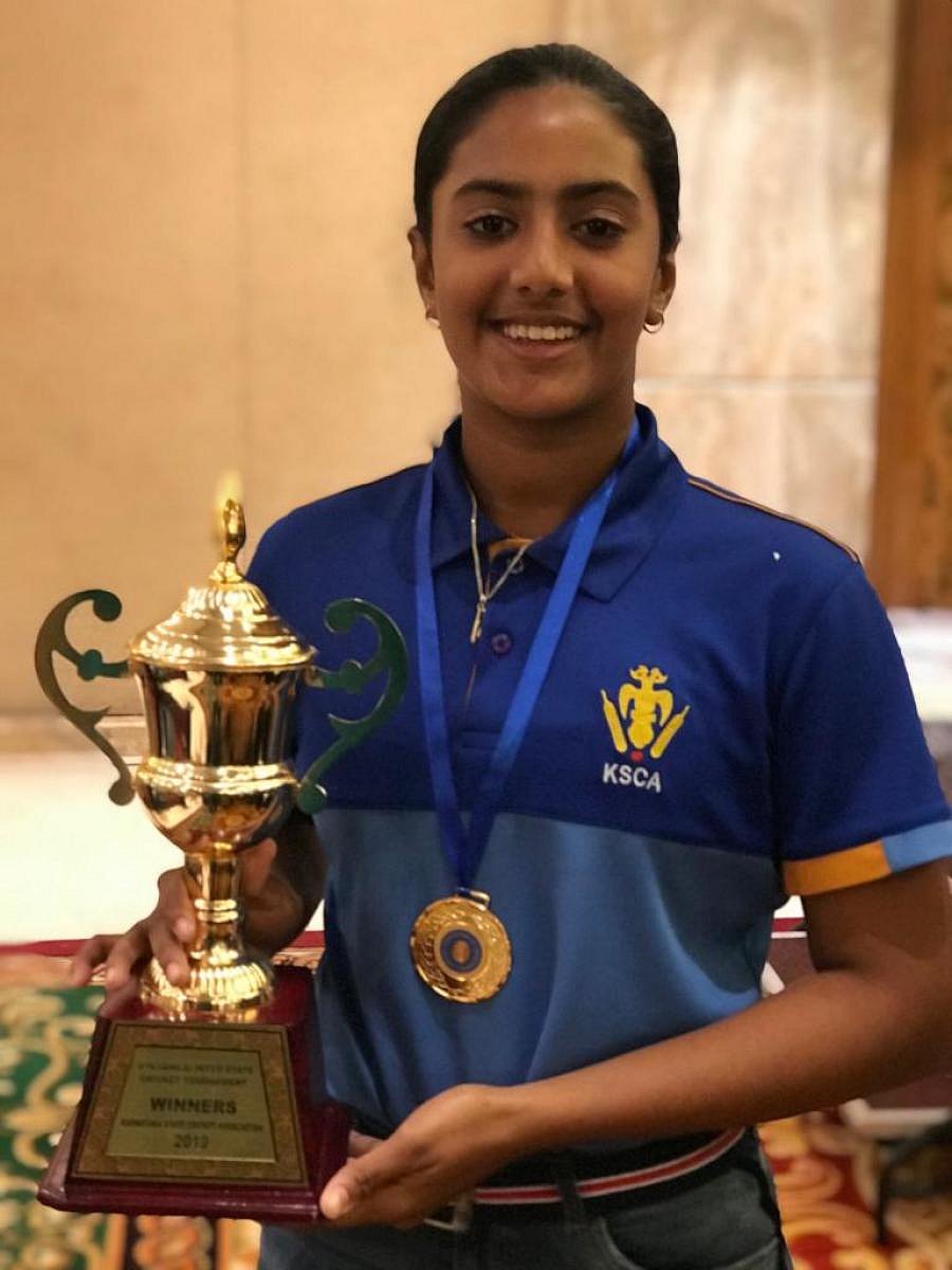 PROMISING: Karnataka's Roshini Kiran with the South Zone U-16 Championship trophy.