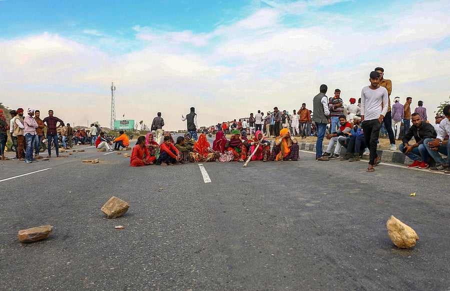 Gujjar community members block NH-58 near Ajmer on Sunday. (PTI)