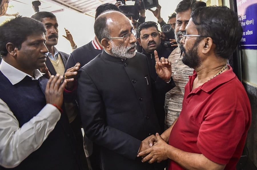 Union Tourism Minister Alphons Joseph Kannanthanam meets a relative of a Karol Bagh fire victim, at Ram Manohar Lohia Hospital in New Delhi, Tuesday, Feb 12, 2019. (PTI Photo)