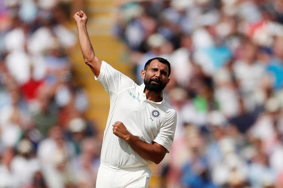 Mohammed Shami celebrates after taking the wicket of England's Dawid Malan. Reuters