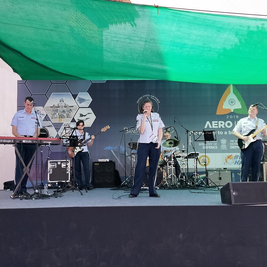 Christin (centre) singing at Aero India. The band comes from the Yokota Air Base, Japan.