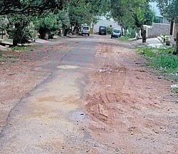 tarred: Asphalting of several roads in the City are taken up on paper, leaving commuters to the nightmarish experience of travelling on damaged stretches. dh photo