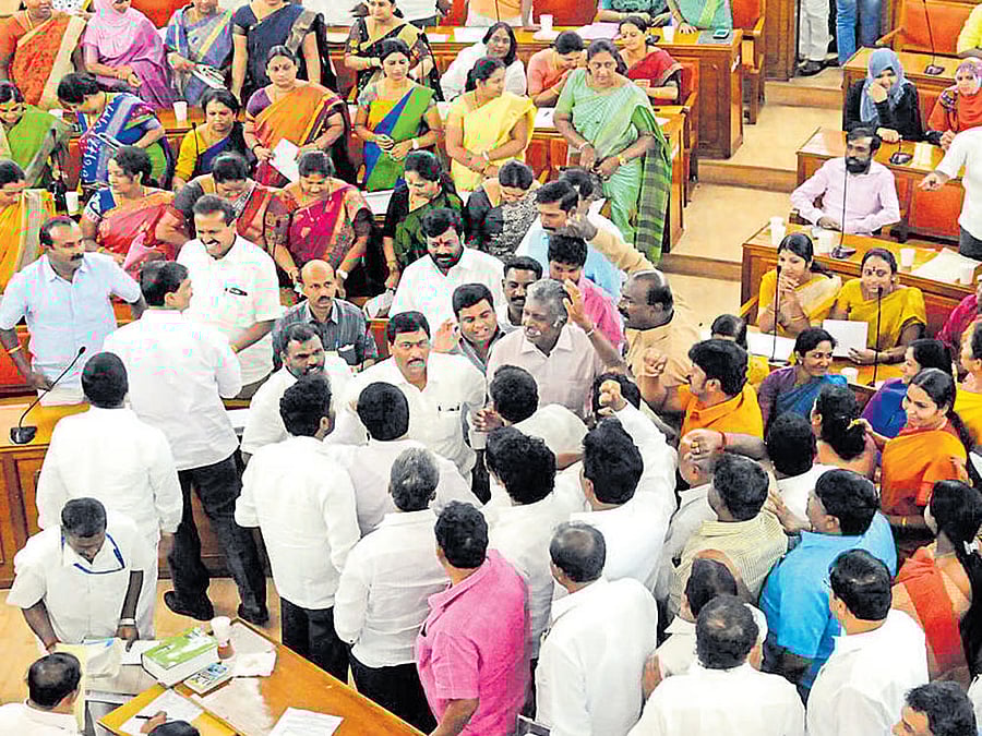 Congress and BJP members argue with each other during the BBMP Council meeting on Tuesday. DH photo