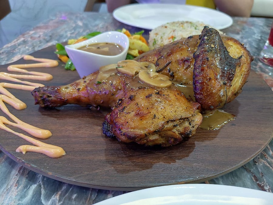 Spanish Roasted Chicken with exotic vegetables and mashed potato.